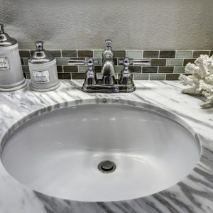 Oval undermount bath sink.