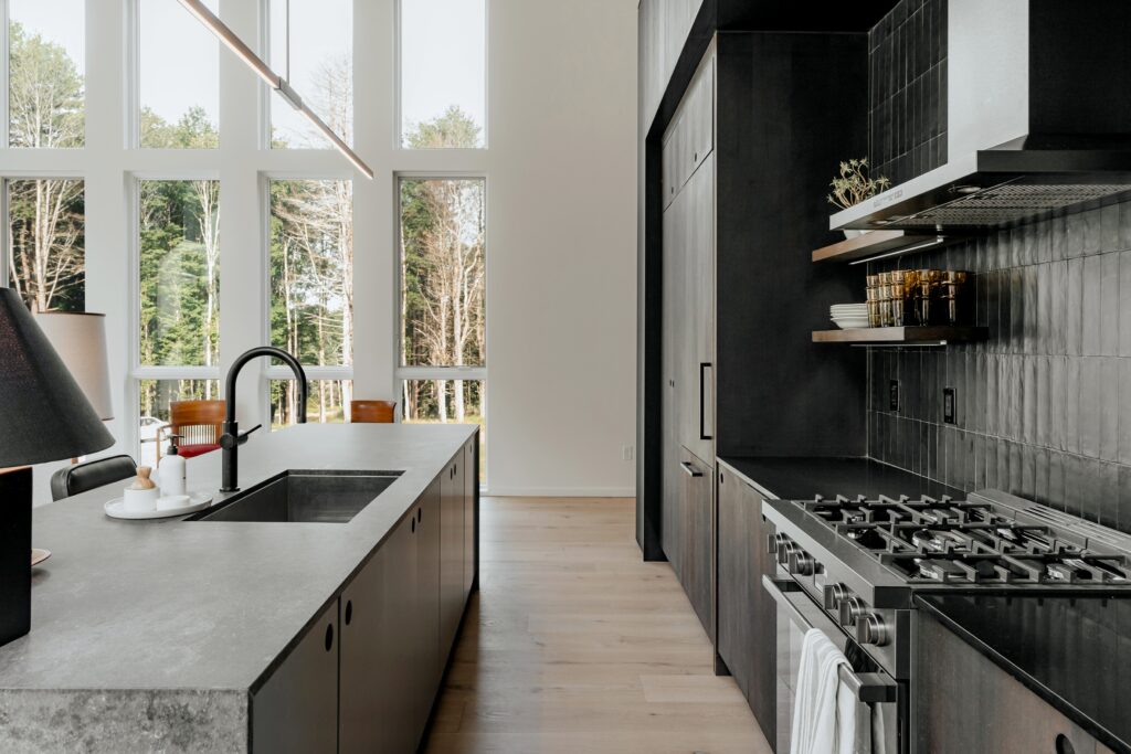 Black kitchen countertops.