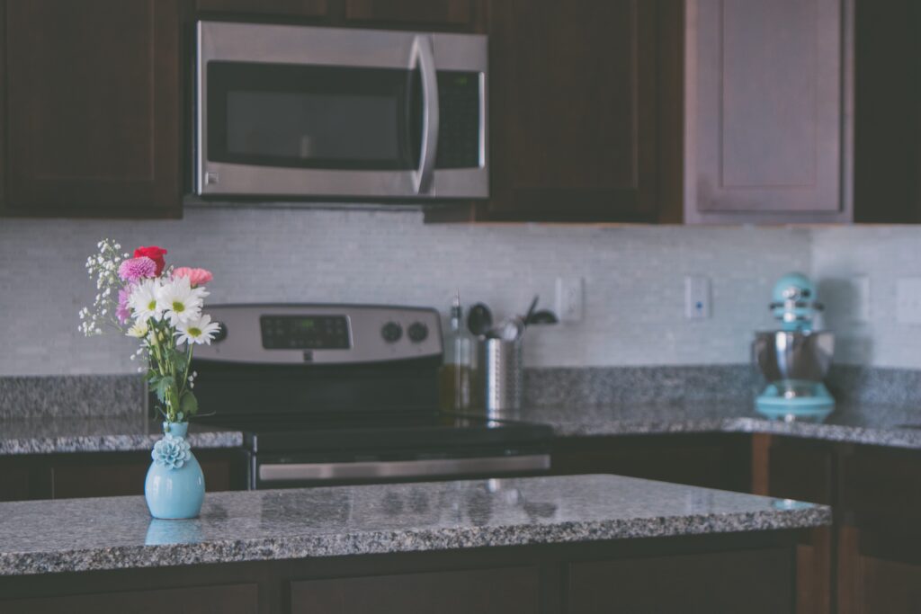 Kitchen with granite countertops.